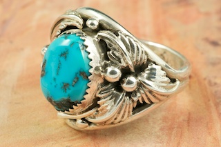 Genuine Sleeping Beauty Turquoise set in Sterling Silver. The Sleeping Beauty Turquoise mine is located in Gila County, Arizona. Created by Navajo Artist Bobby Piaso. Signed.